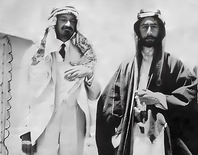 Emir Feisal I (right) and Chaim Weizmann (also wearing Arab dress as a sign of friendship) in Syria. At this time, Feisal was living in Syria.